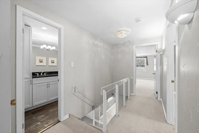 a spacious bathroom with a bathtub and a sink