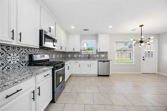 a view of a livingroom with a furniture