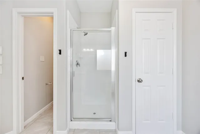 a bathroom with a bathtub and a sink