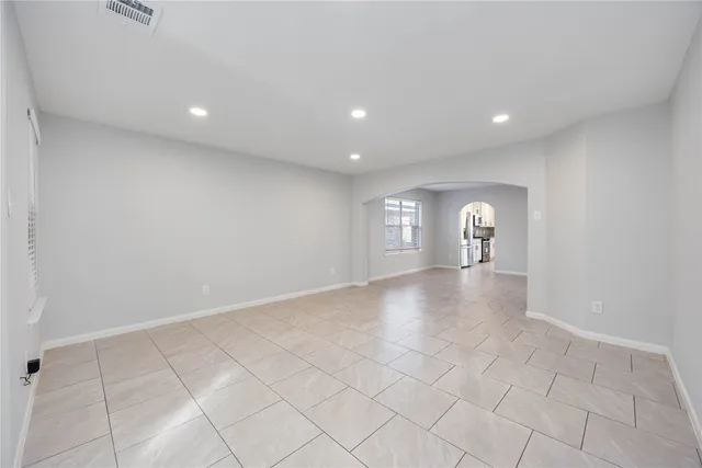 a view of an empty room and a windows