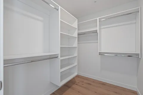a view of an empty walk in closet