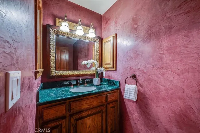 a view of front door with wooden floor