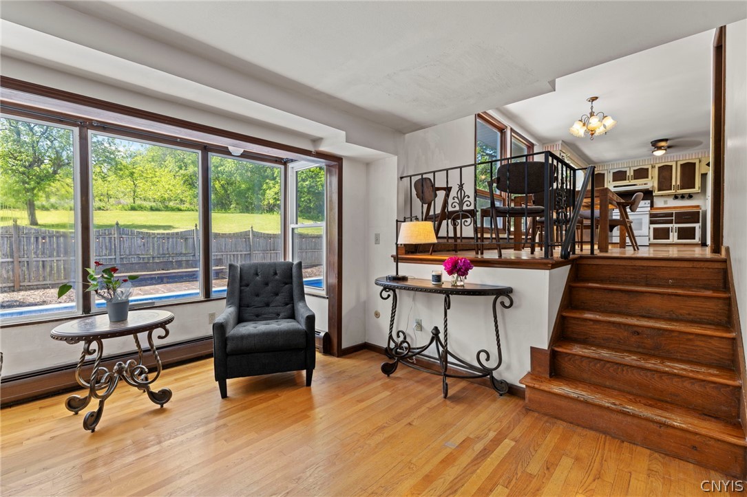 2170 Bitters Road Camillus, NY 13031 - Photo 18 of 47 Stairs from the kitchen leads you down to the fami
