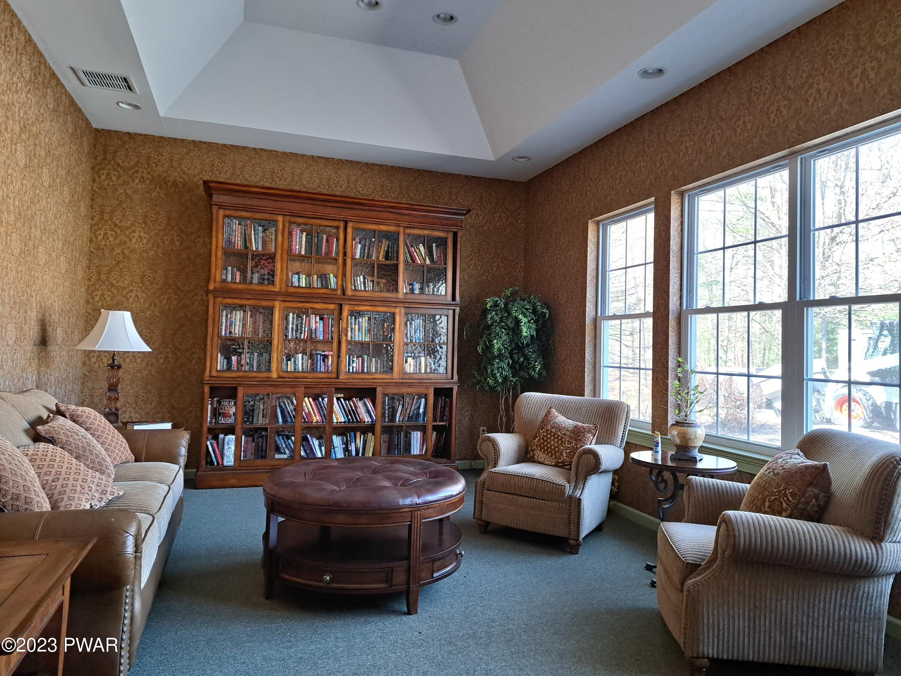 806 MacIntosh Way Matamoras, PA 18336 - Photo 49 of 53 a living room with furniture and a window