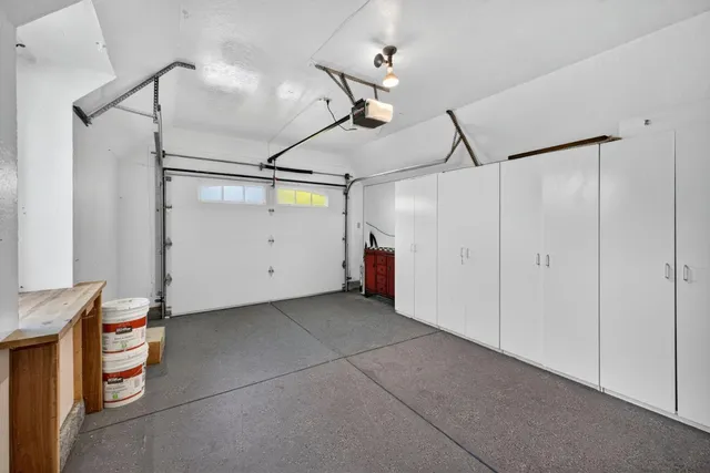 a view of a balcony with furniture