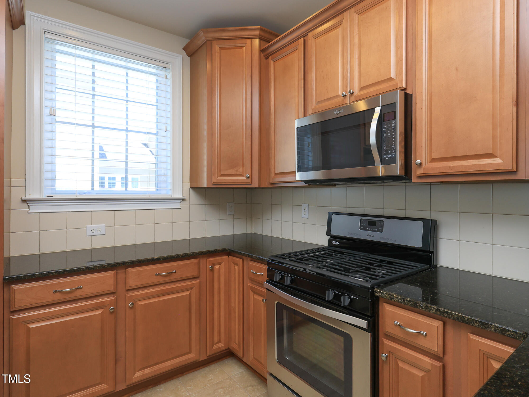 10529 Sablewood Drive, Unit 116 Raleigh, NC 27617 - Photo 19 of 57 025_10529_sablewood_116_kitchen