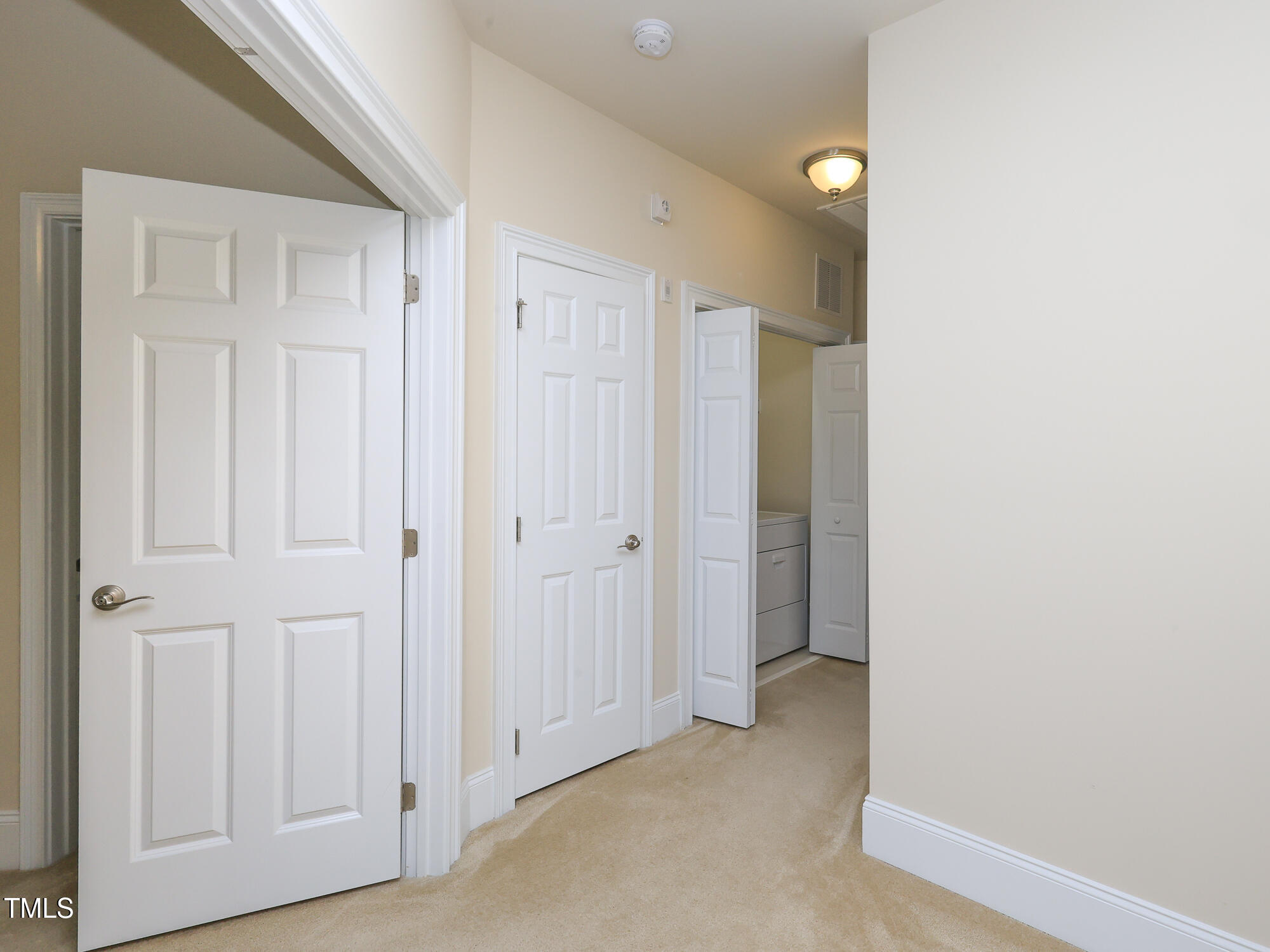 10529 Sablewood Drive, Unit 116 Raleigh, NC 27617 - Photo 27 of 57 037_10529_sablewood_116_upstairs_hallway