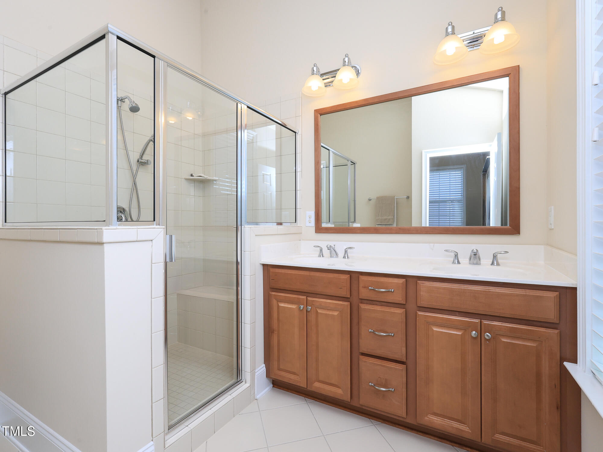 10529 Sablewood Drive, Unit 116 Raleigh, NC 27617 - Photo 33 of 57 043_10529_sablewood_116_primary_bath