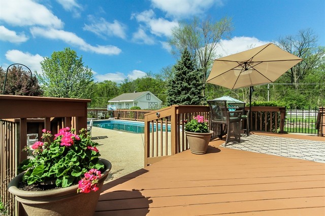 5N884 Dunham Trails Road Wayne, IL 60184 - Photo 18 of 26 a view of a backyard that has potted plants