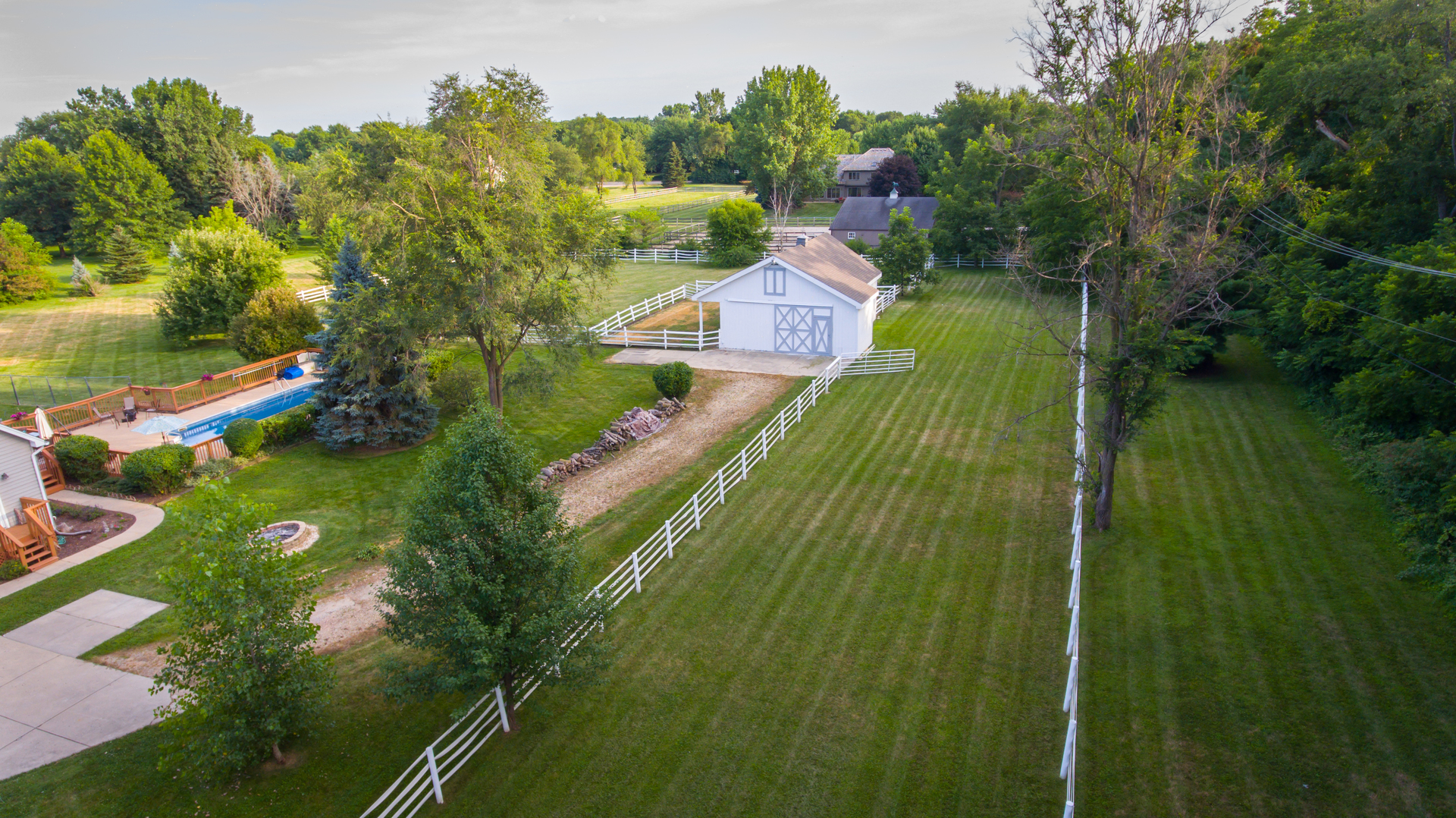5N884 Dunham Trails Road Wayne, IL 60184 - Photo 22 of 26 a aerial view of a house with a yard