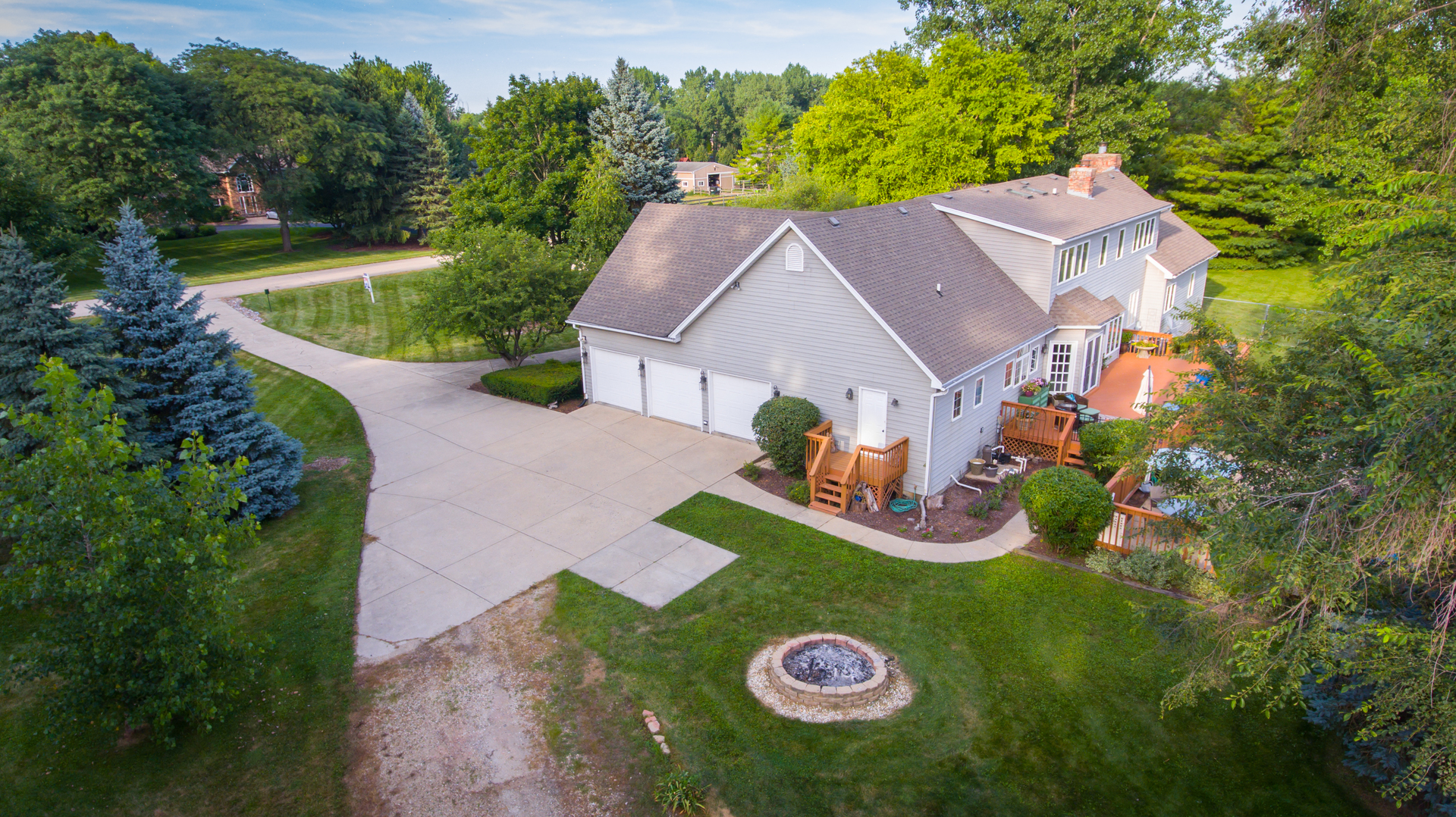 5N884 Dunham Trails Road Wayne, IL 60184 - Photo 23 of 26 an aerial view of a house with garden space and street view
