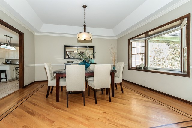 5N884 Dunham Trails Road Wayne, IL 60184 - Photo 5 of 26 a view of a dining room with furniture wooden floor and chandelier