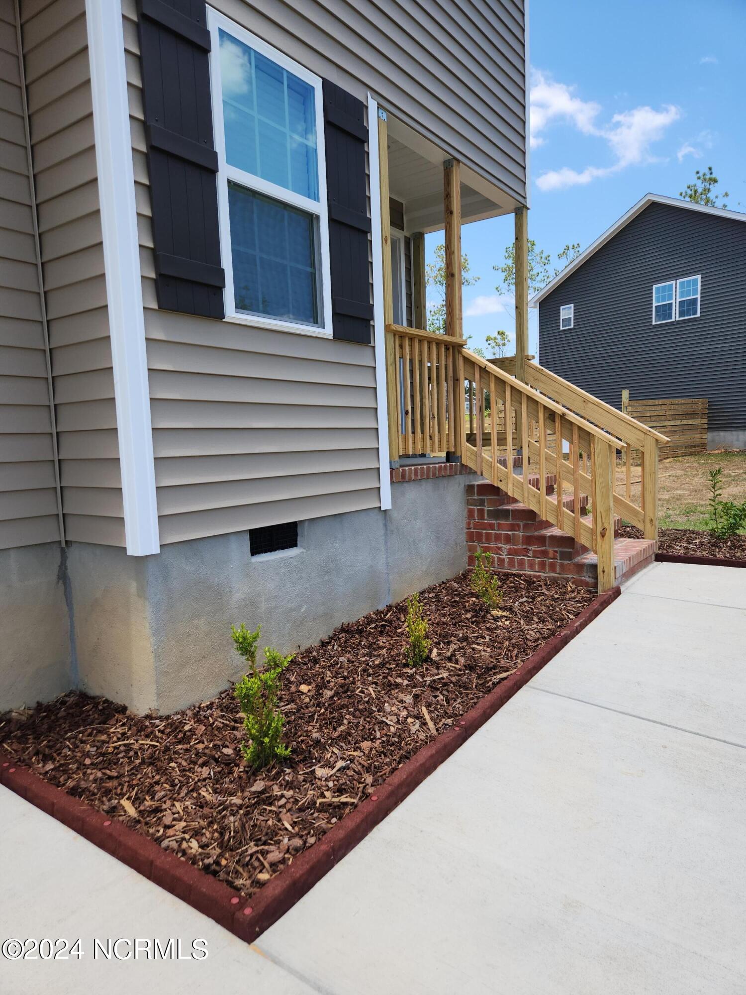 705 Gridiron Way Cameron, NC 28326 - Photo 2 of 29 20240618_134426