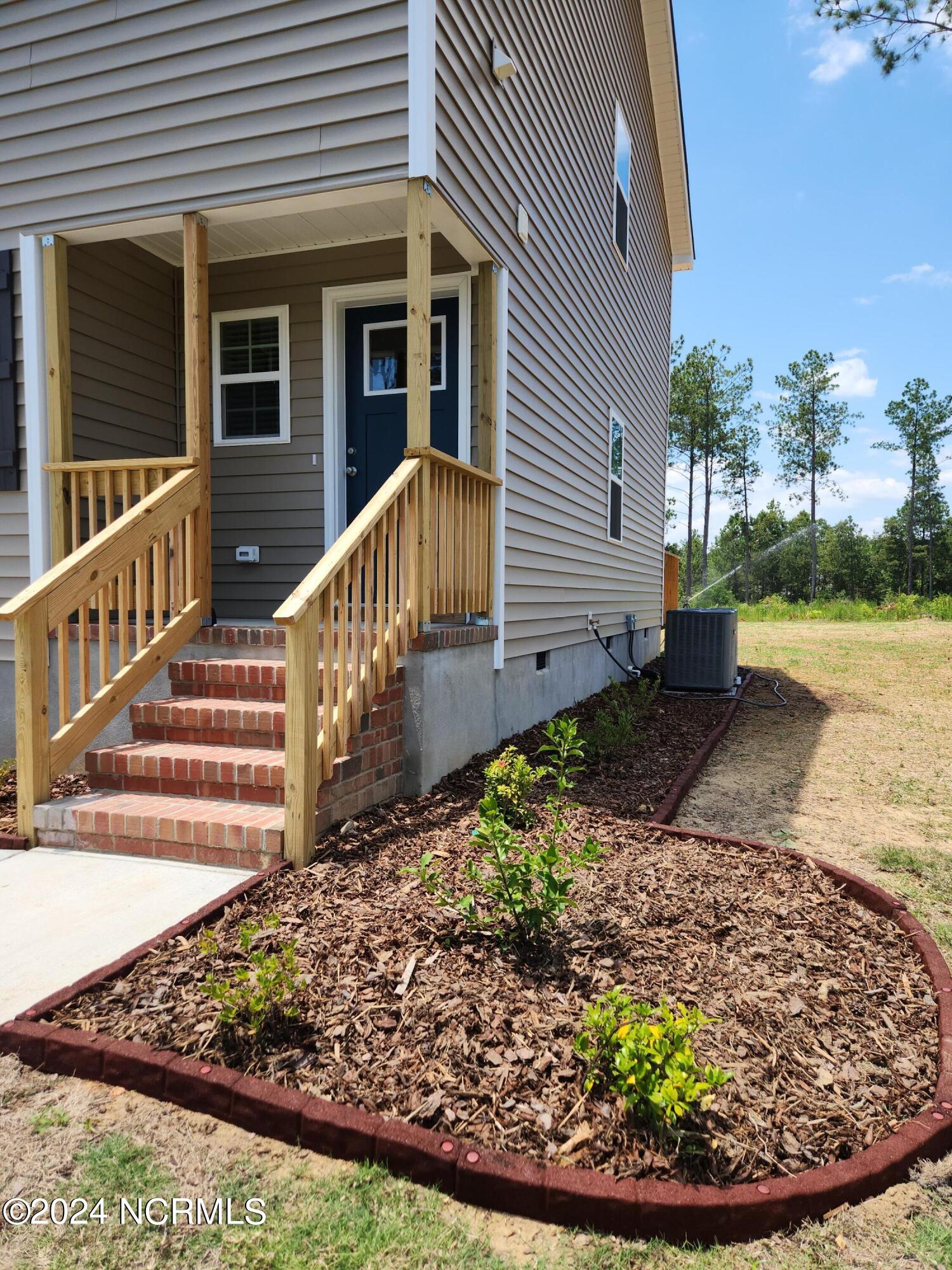 705 Gridiron Way Cameron, NC 28326 - Photo 3 of 29 20240618_134440