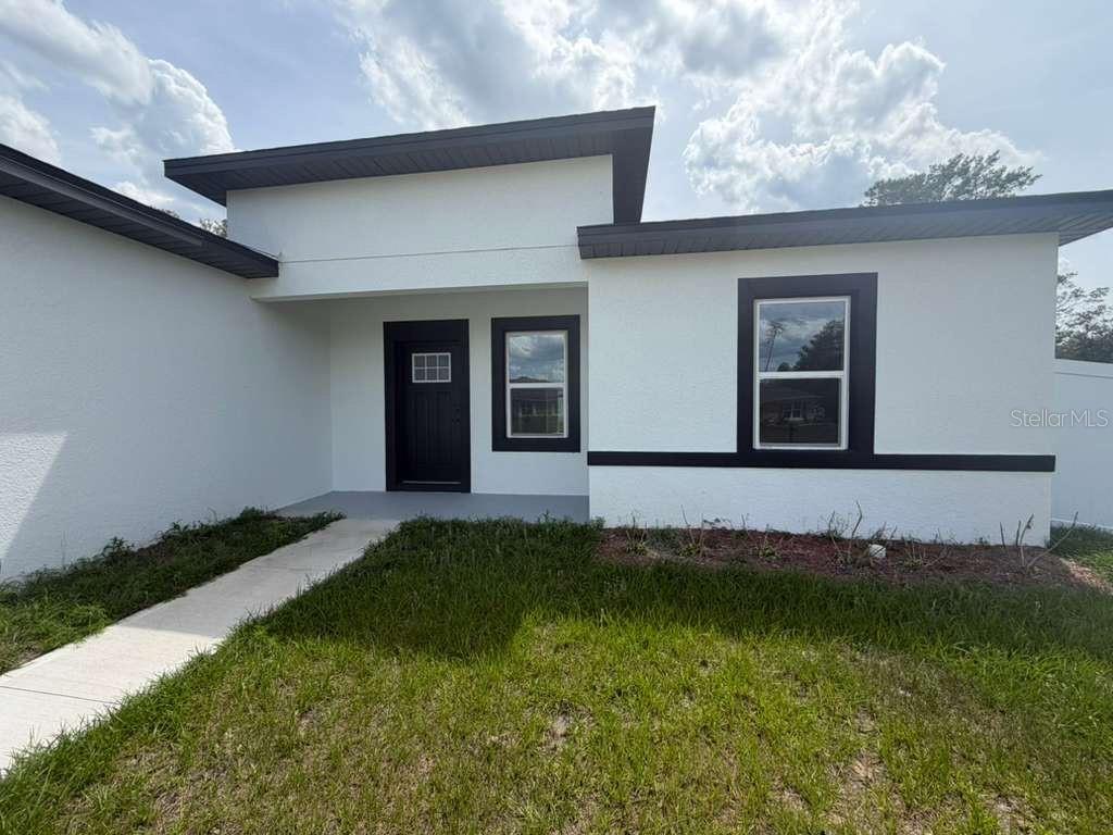 16252 Southwest 27th Terrace Road Ocala, FL 34473 - Photo 14 of 15 a view of swimming pool with yard