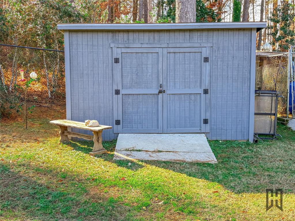 701 Forest Drive Homer, LA 71040 - Photo 31 of 34 Lawn equipment shed