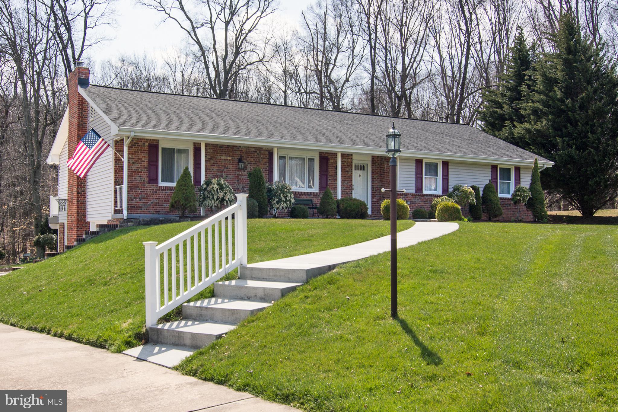1104 Sturbridge Road Fallston, MD 21047 - Photo 1 of 28 a view of a house with a yard and tree s
