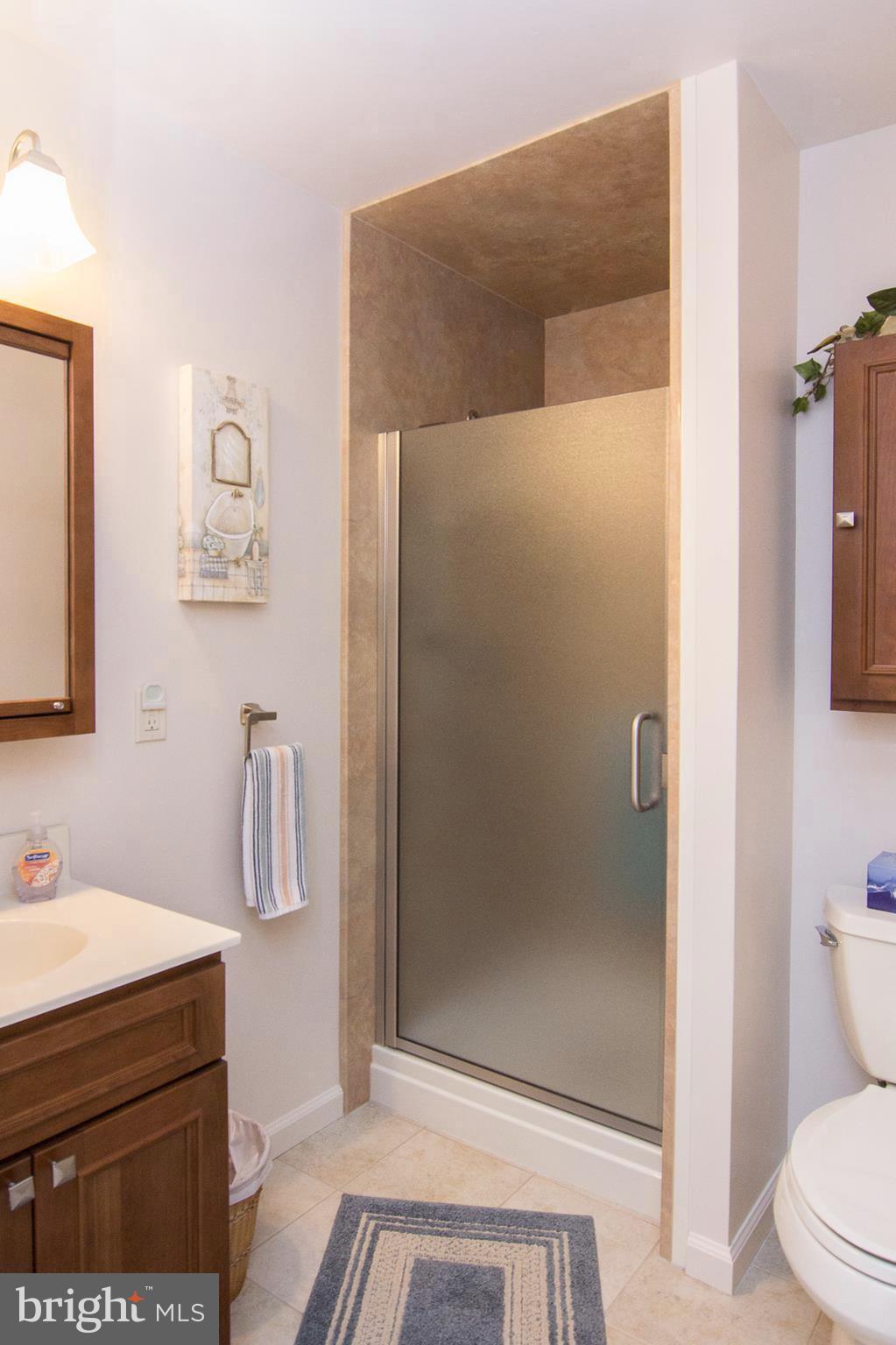 1104 Sturbridge Road Fallston, MD 21047 - Photo 17 of 28 a bathroom with a shower and toilet
