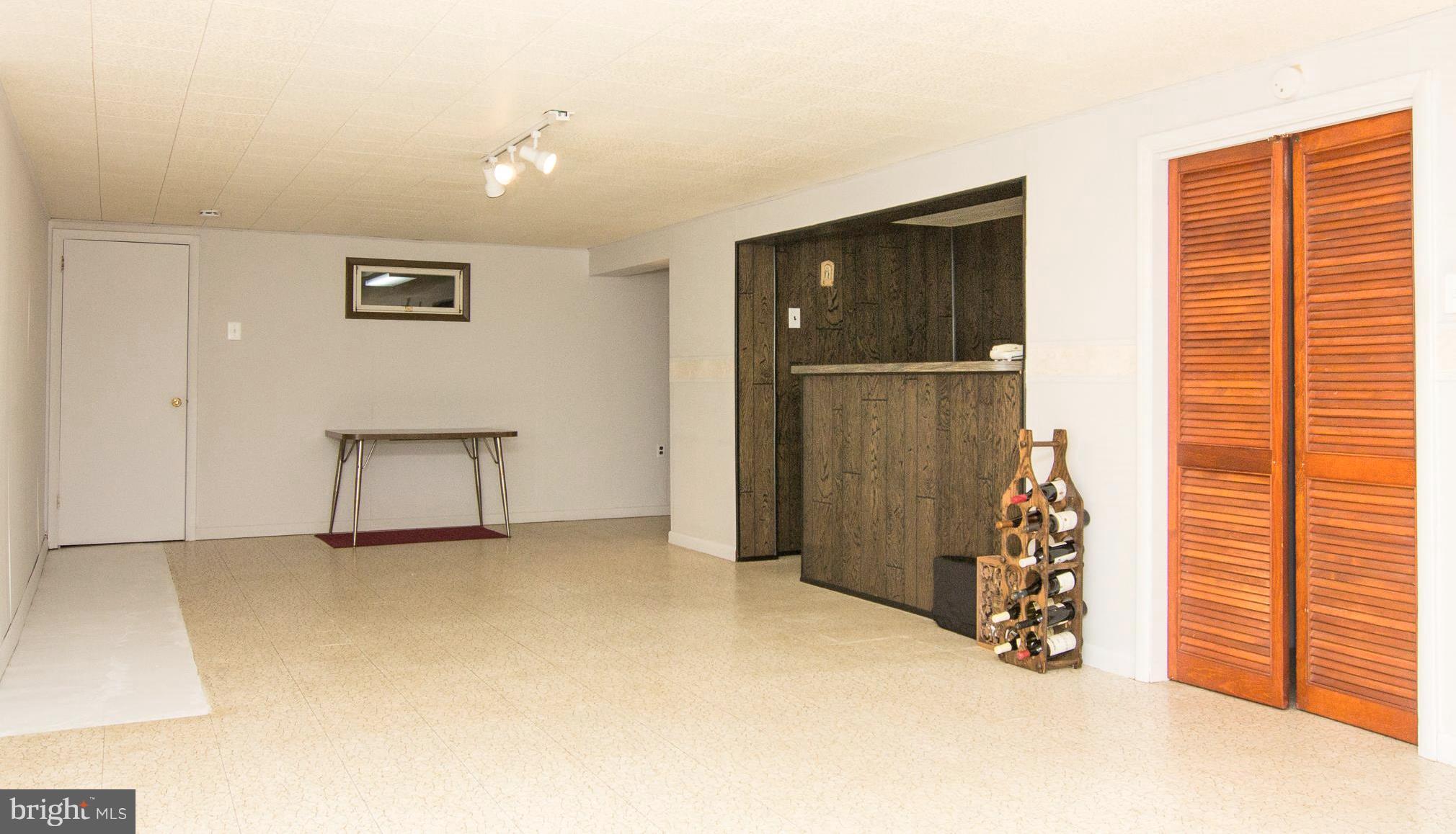 1104 Sturbridge Road Fallston, MD 21047 - Photo 18 of 28 an empty room with closet and mirror