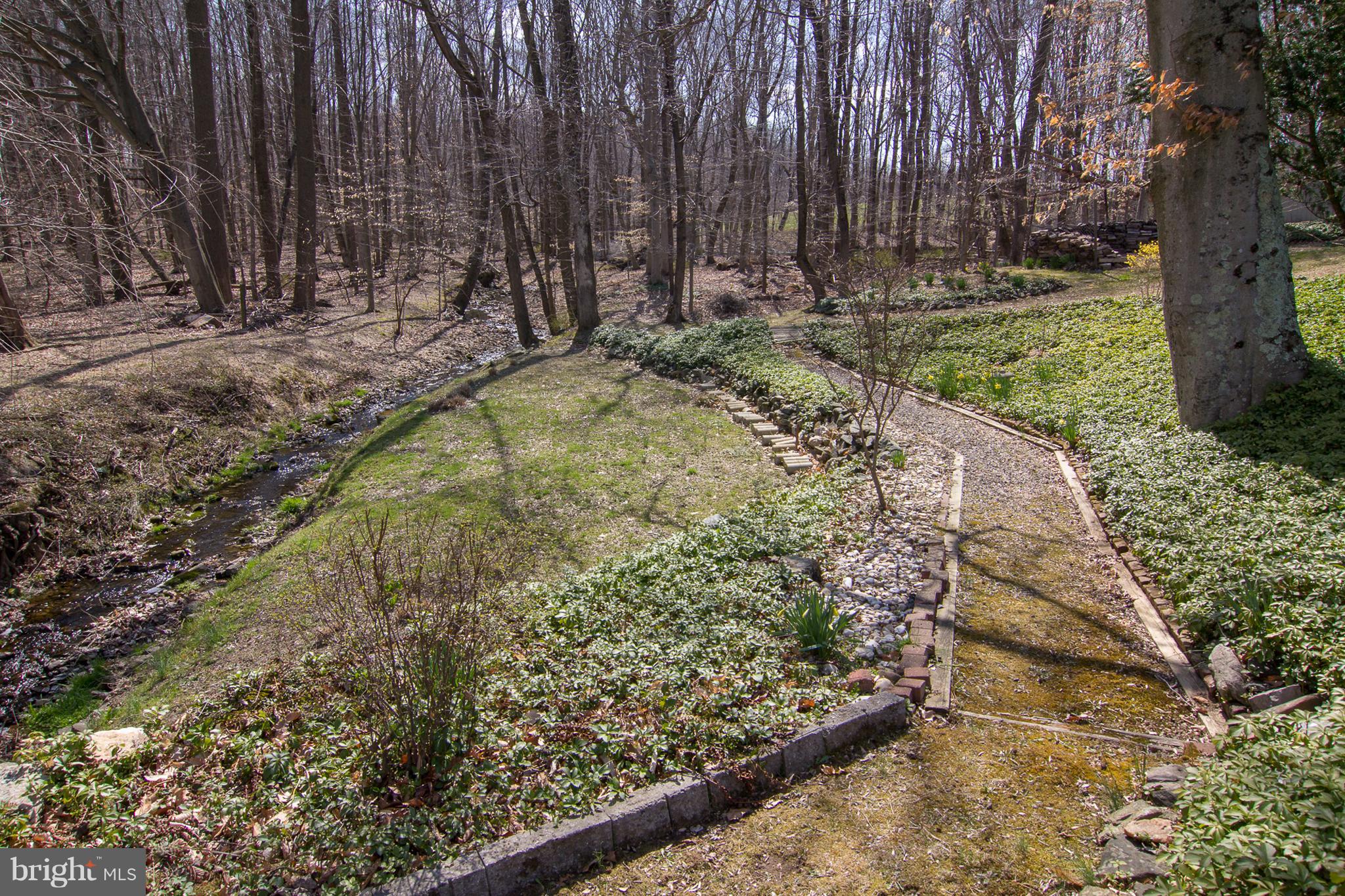1104 Sturbridge Road Fallston, MD 21047 - Photo 28 of 28 a view of a garden with large trees