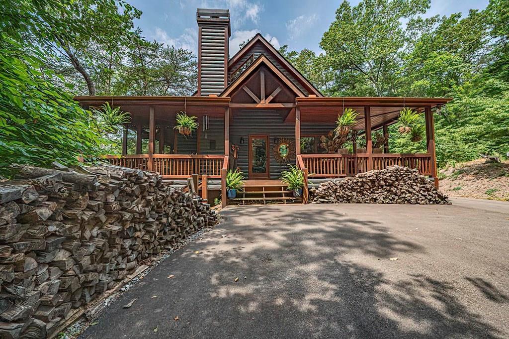 35 Leatherwood Mountain Road Cherry Log, GA 30522 - Photo 35 of 58 a view of a chair and table in the backyard