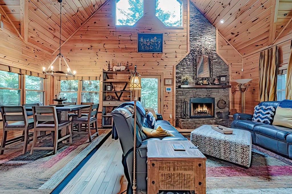 35 Leatherwood Mountain Road Cherry Log, GA 30522 - Photo 5 of 58 a living room with furniture and a fireplace