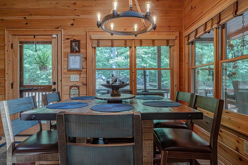 35 Leatherwood Mountain Road Cherry Log, GA 30522 - Photo 7 of 58 a view of a dining room with furniture window and outside view
