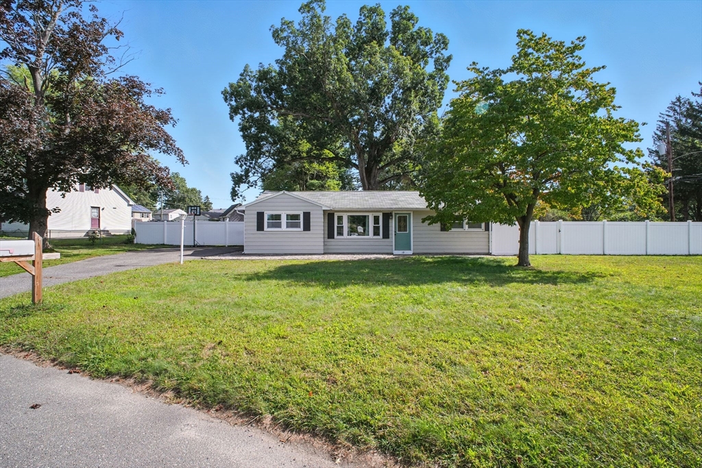 19 Harbour Road Springfield, MA 01118 - Photo 1 of 28 a view of a house with a backyard