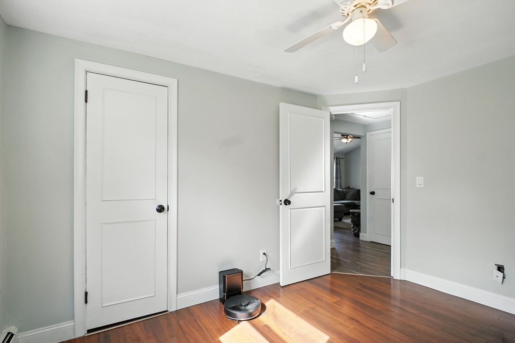 19 Harbour Road Springfield, MA 01118 - Photo 21 of 28 wooden floor in an empty room with a window