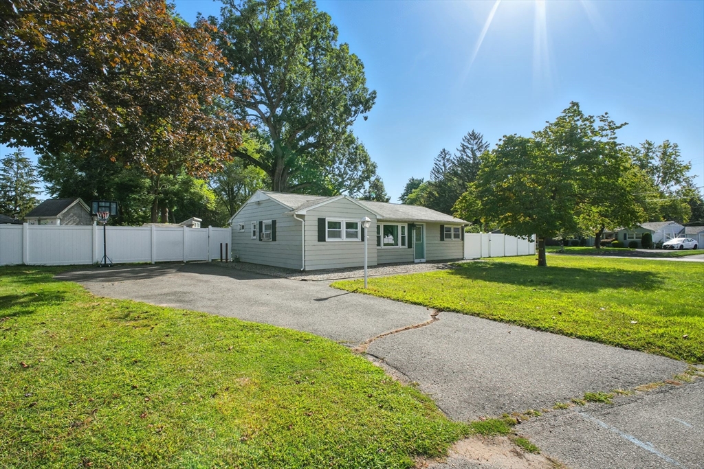 19 Harbour Road Springfield, MA 01118 - Photo 3 of 28 a swimming pool with wooden fence