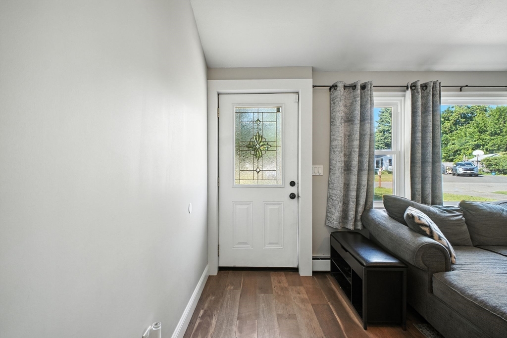 19 Harbour Road Springfield, MA 01118 - Photo 7 of 28 a living room with furniture and a window