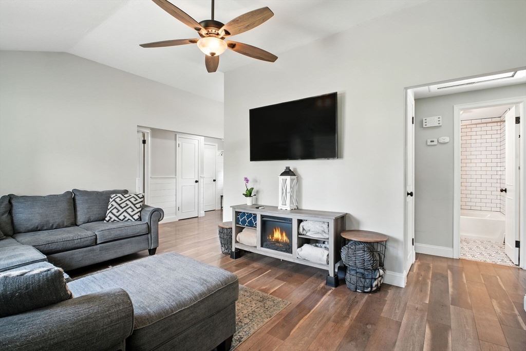 19 Harbour Road Springfield, MA 01118 - Photo 9 of 28 a living room with furniture and a flat screen tv
