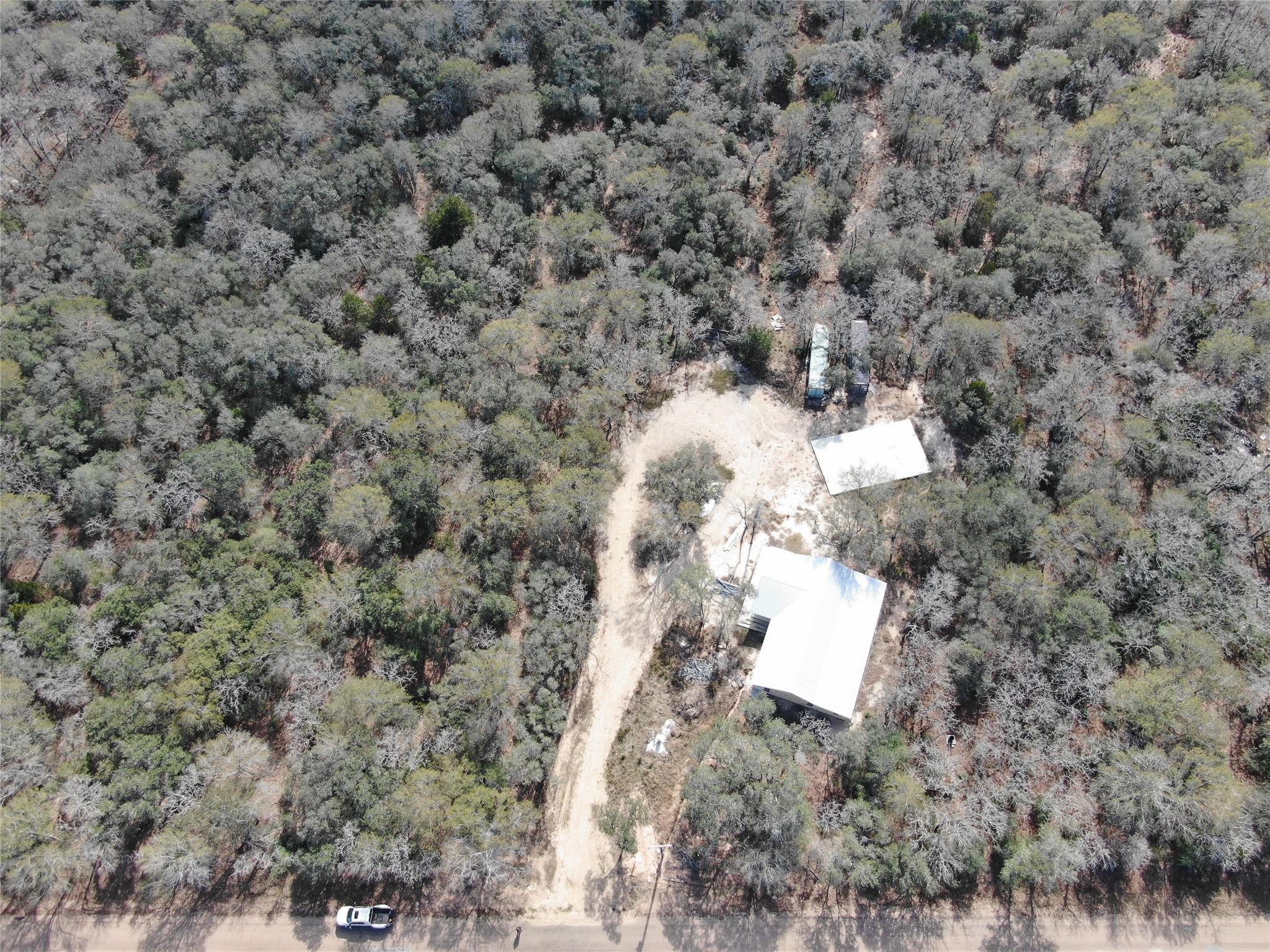 1044 Reeves Road Garwood, TX 77442 - Photo 5 of 18 a view of a dry yard