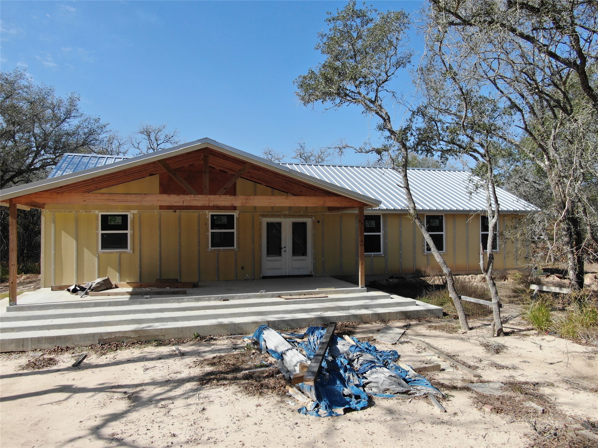 1044 Reeves Road Garwood, TX 77442 - Photo 8 of 18 a view of a house with snow on the wall