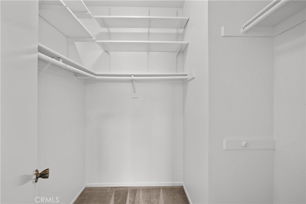 27645 Susan Beth Way, Unit A Saugus, CA 91350 - Photo 17 of 26 a view of an empty walk in closet