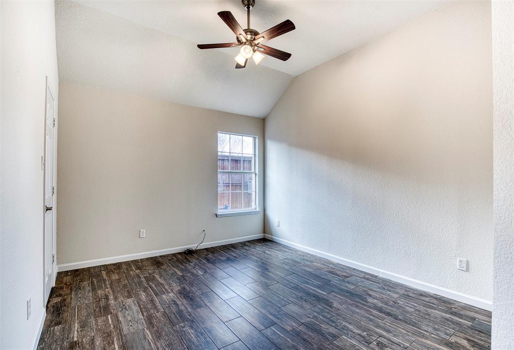 10814 Spring Lake Road Frisco, TX 75035 - Photo 24 of 40 wooden floor in an empty room with a window