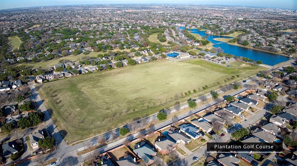 10814 Spring Lake Road Frisco, TX 75035 - Photo 37 of 40 an aerial view of residential houses with outdoor space