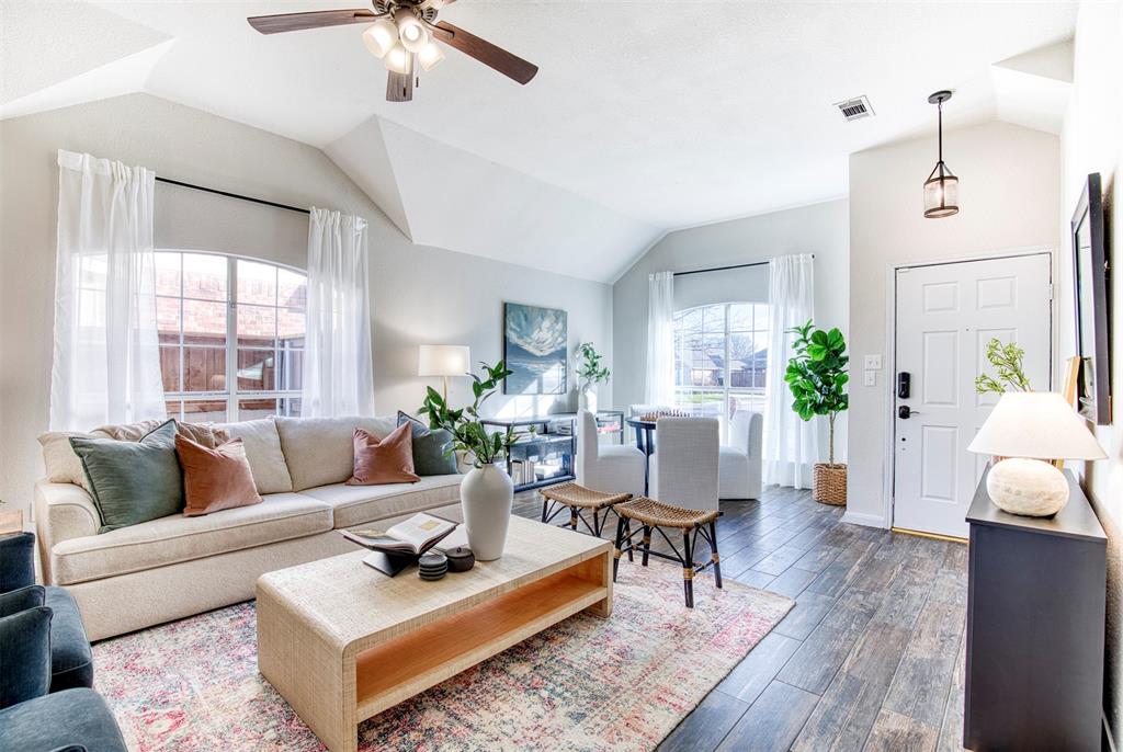 10814 Spring Lake Road Frisco, TX 75035 - Photo 4 of 40 a living room with furniture and a large window