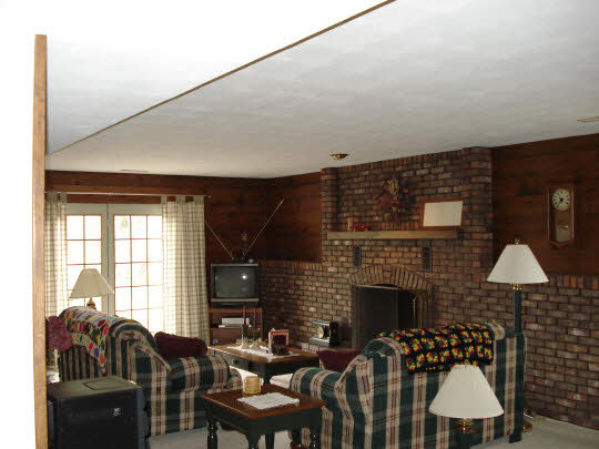 7823 East Rockton Road Roscoe, IL 61073 - Photo 3 of 6 a dining room with furniture and a fireplace