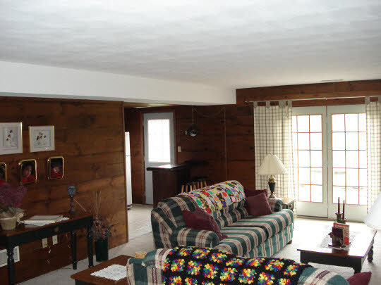 7823 East Rockton Road Roscoe, IL 61073 - Photo 4 of 6 a living room with furniture and a window