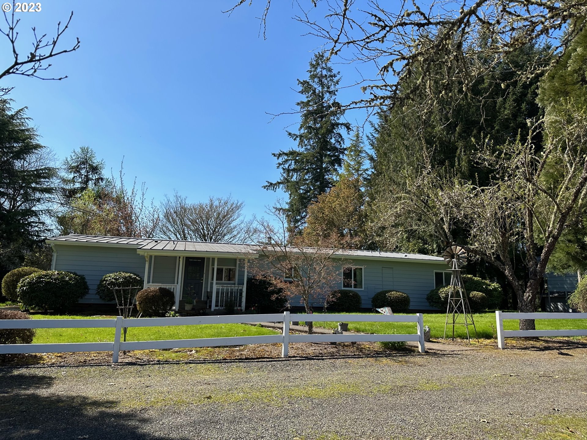 a view of outdoor space with swimming pool and furniture
