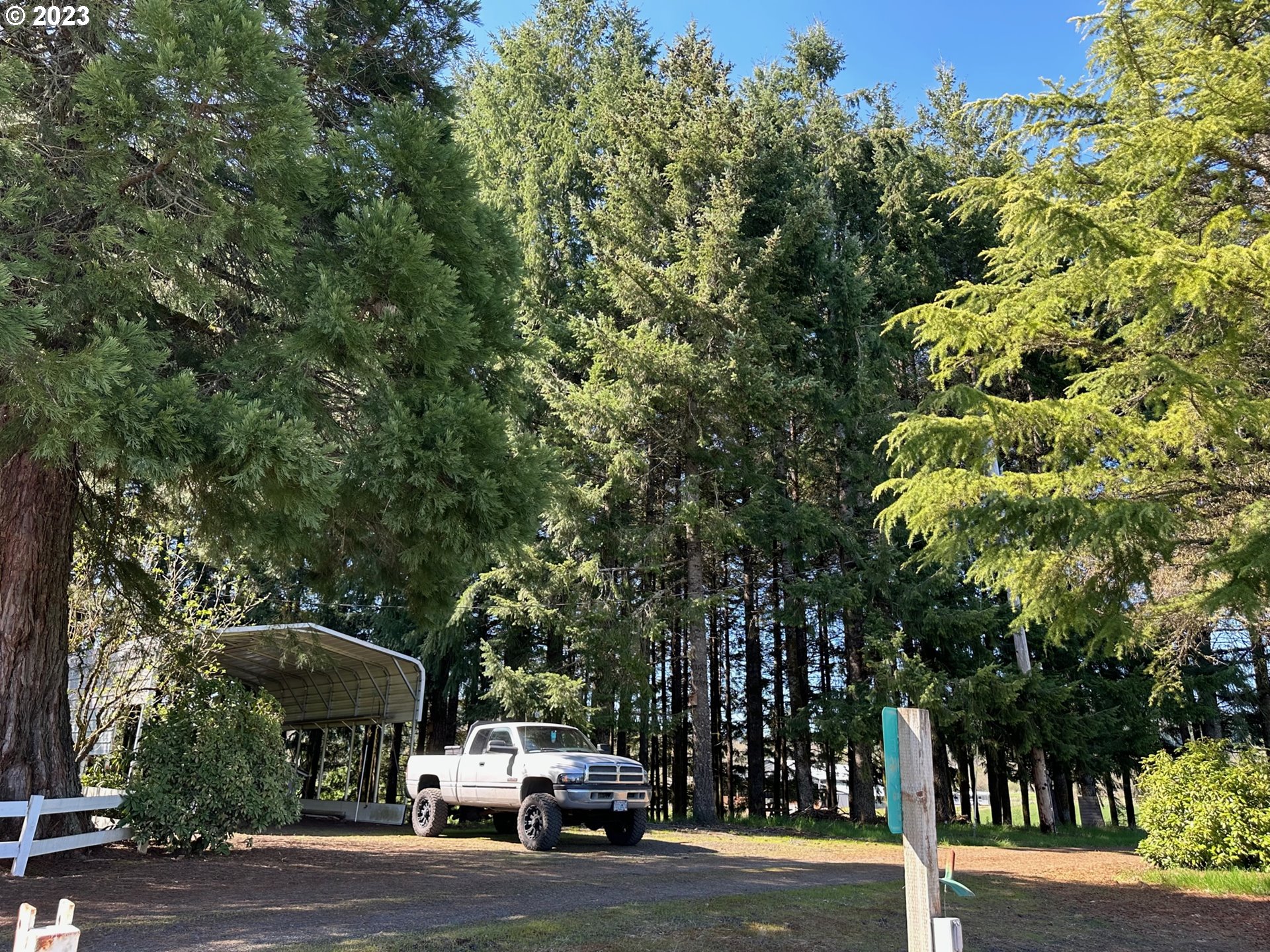 49660 Northwest Pongratz Road Banks, OR 97106 - Photo 13 of 22 a car parked on the side of the road