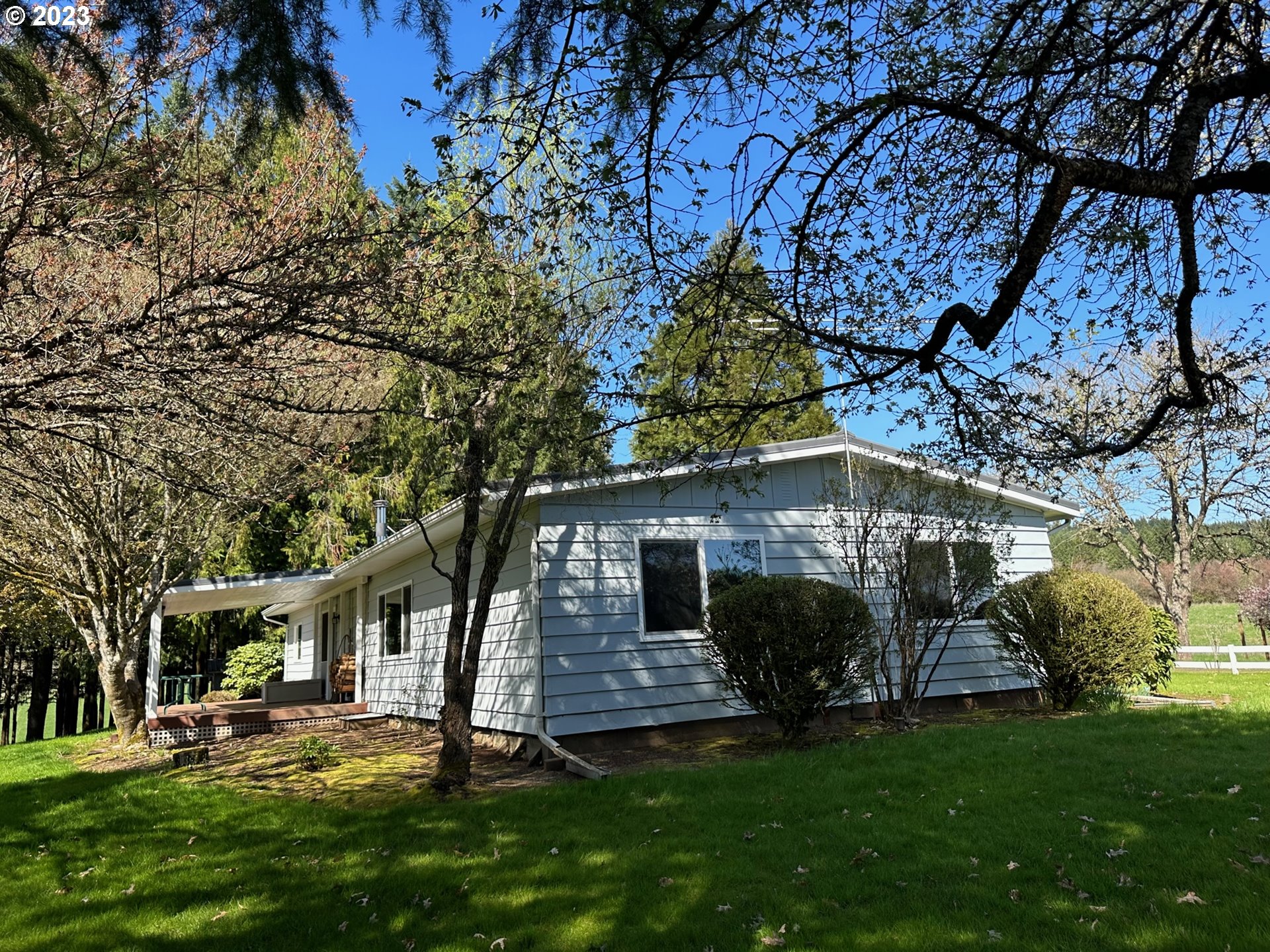 49660 Northwest Pongratz Road Banks, OR 97106 - Photo 3 of 22 front view of a house with a yard
