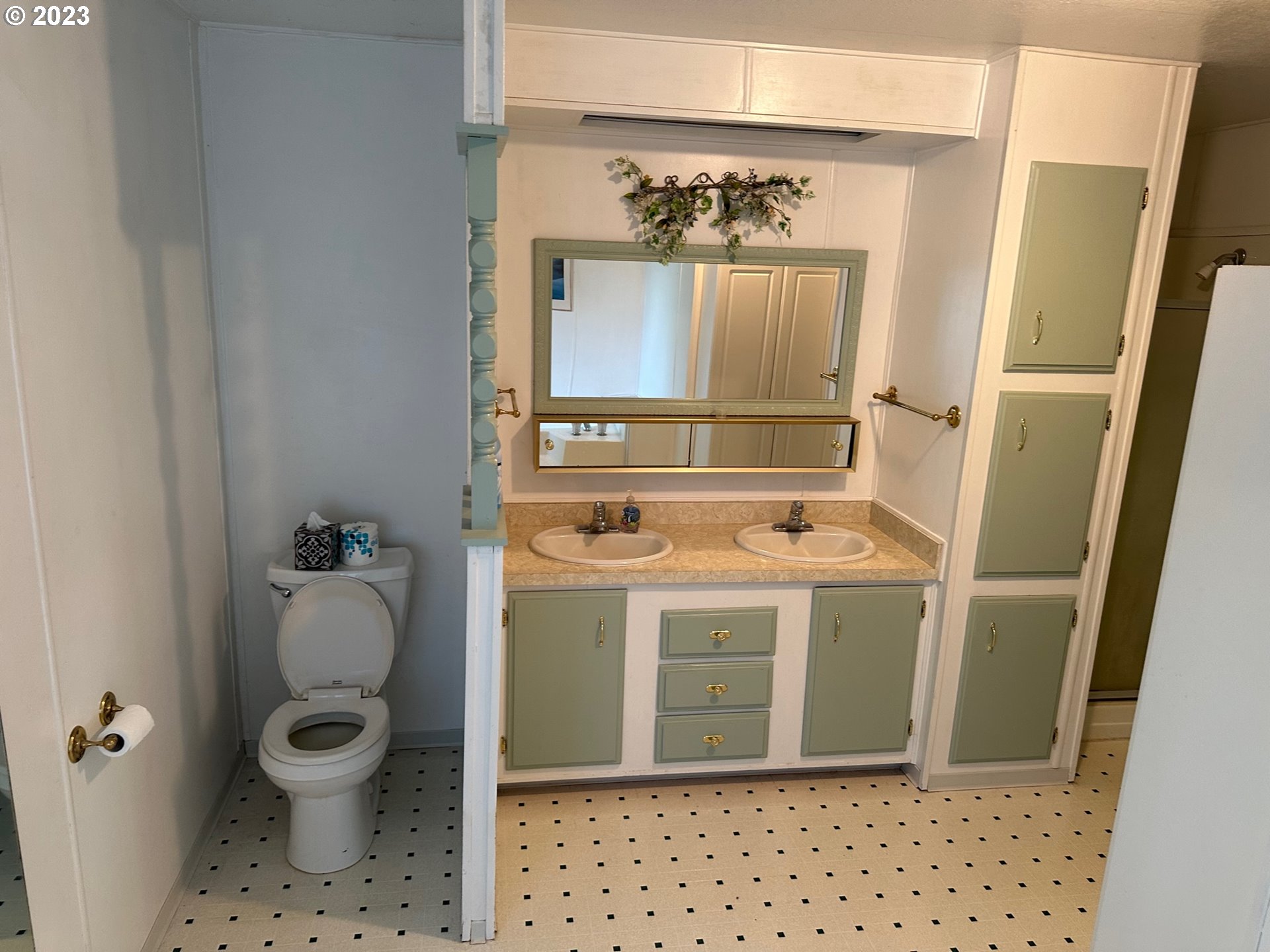 49660 Northwest Pongratz Road Banks, OR 97106 - Photo 8 of 22 a bathroom with a granite countertop toilet a sink and a mirror