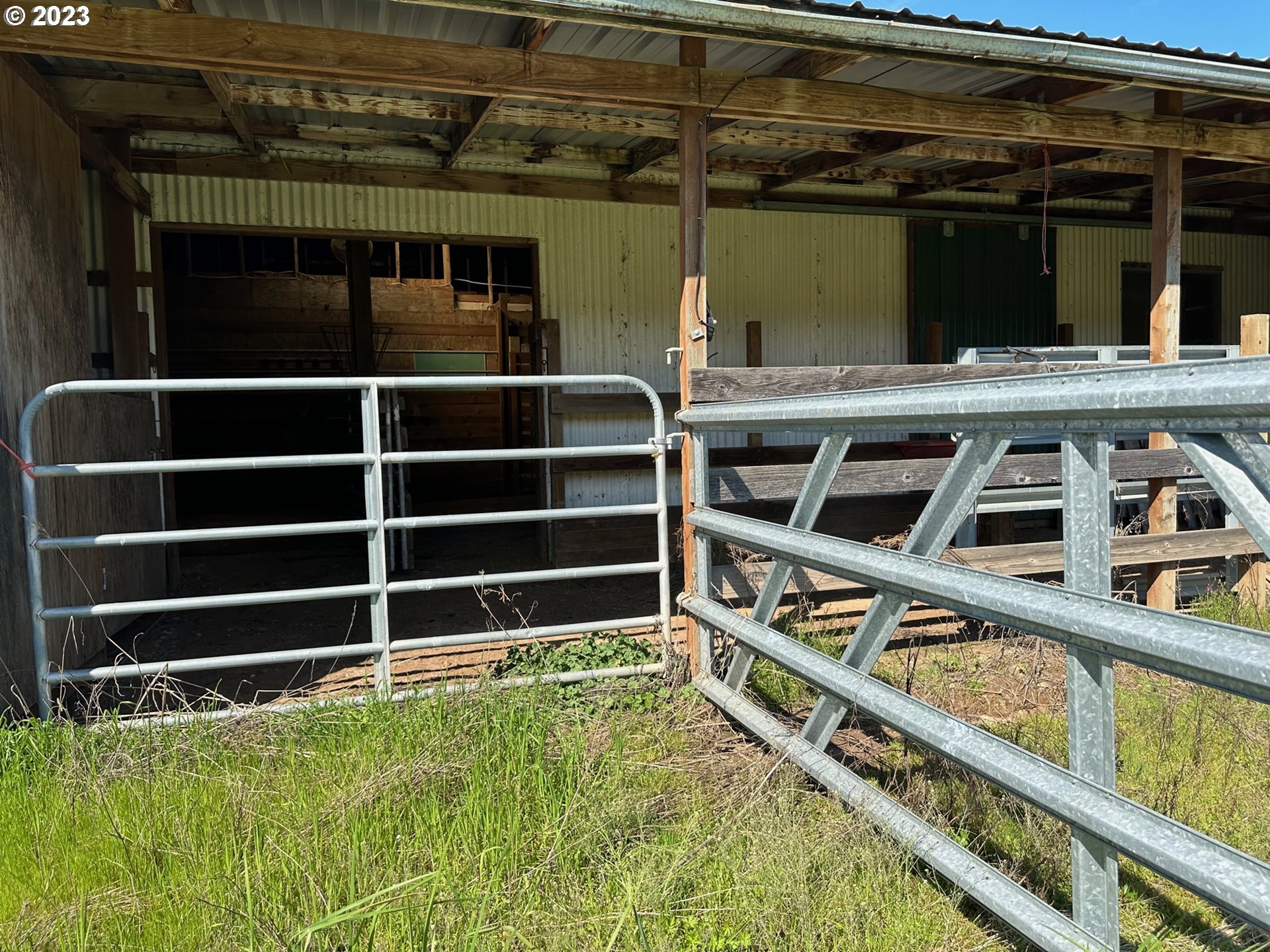 49660 Northwest Pongratz Road Banks, OR 97106 - Photo 10 of 22 a view of an empty room with wooden floor and a window