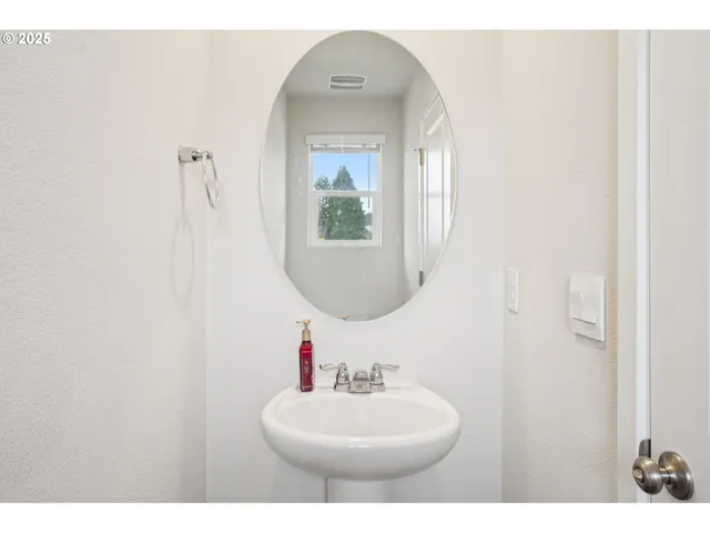a bathroom with a sink a toilet and a bathtub