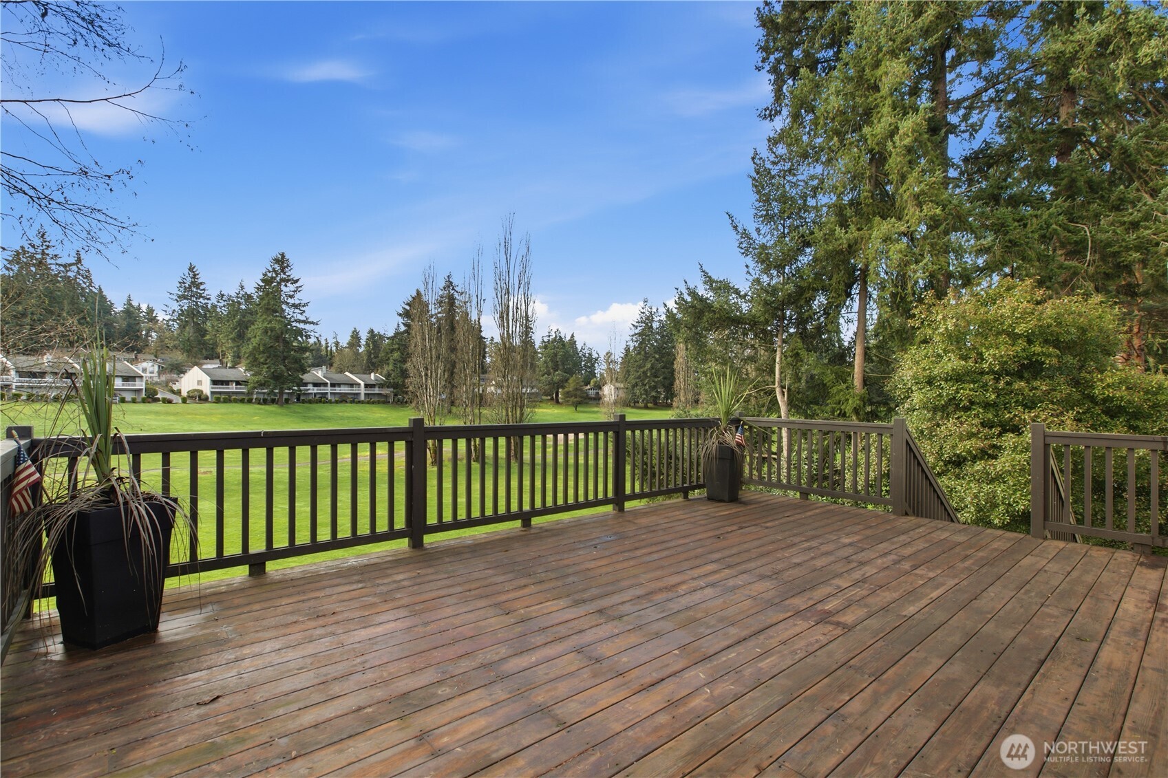 32417 29th Avenue Southwest Federal Way, WA 98023 - Photo 14 of 39 a view of a deck with a large window and wooden floor