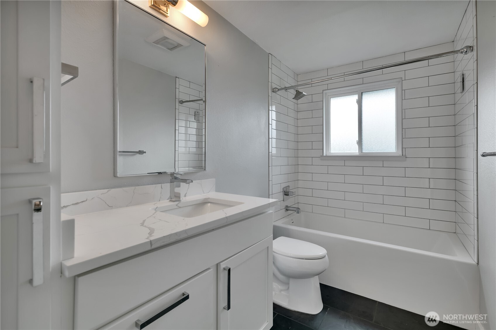 32417 29th Avenue Southwest Federal Way, WA 98023 - Photo 21 of 39 a bathroom with a sink toilet tub and shower