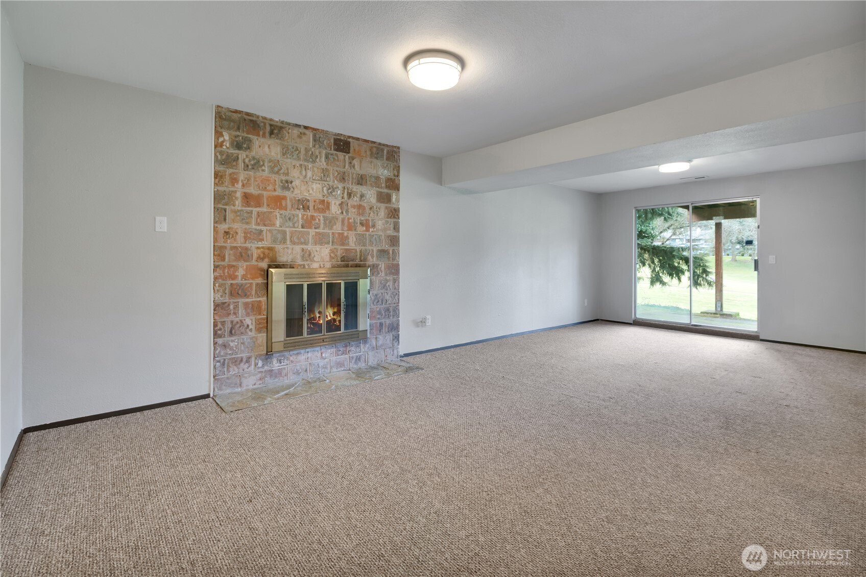 32417 29th Avenue Southwest Federal Way, WA 98023 - Photo 23 of 39 a view of empty room with a fireplace