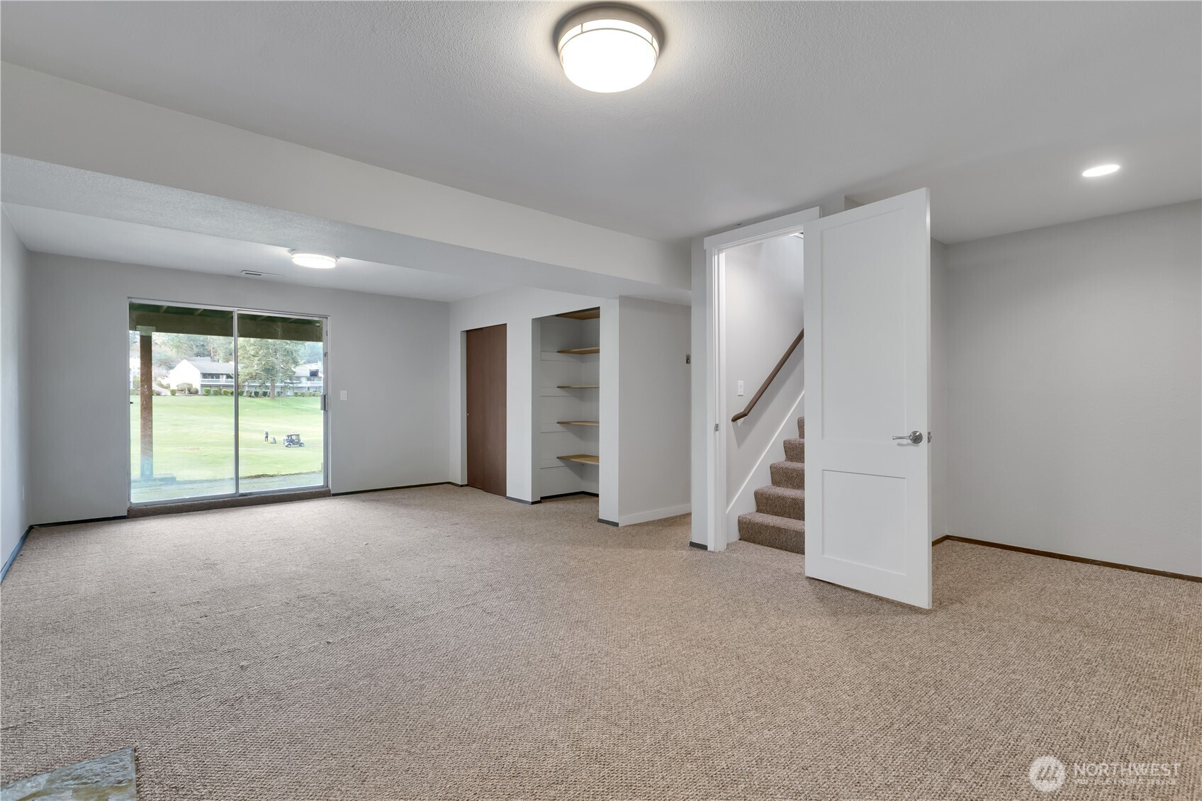 32417 29th Avenue Southwest Federal Way, WA 98023 - Photo 24 of 39 an empty room with furniture and stairs